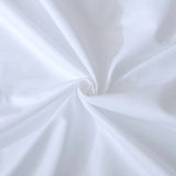 Close-up of Luxe Cotton Sateen Pillowcase Set in White by Linenly, featuring a swirl pattern at the center that highlights the soft folds and gentle shadows of these premium pillowcases.